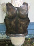 Metal breastplate with patina
